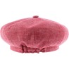 Plain women's newsboy cap, with elastic at the back.