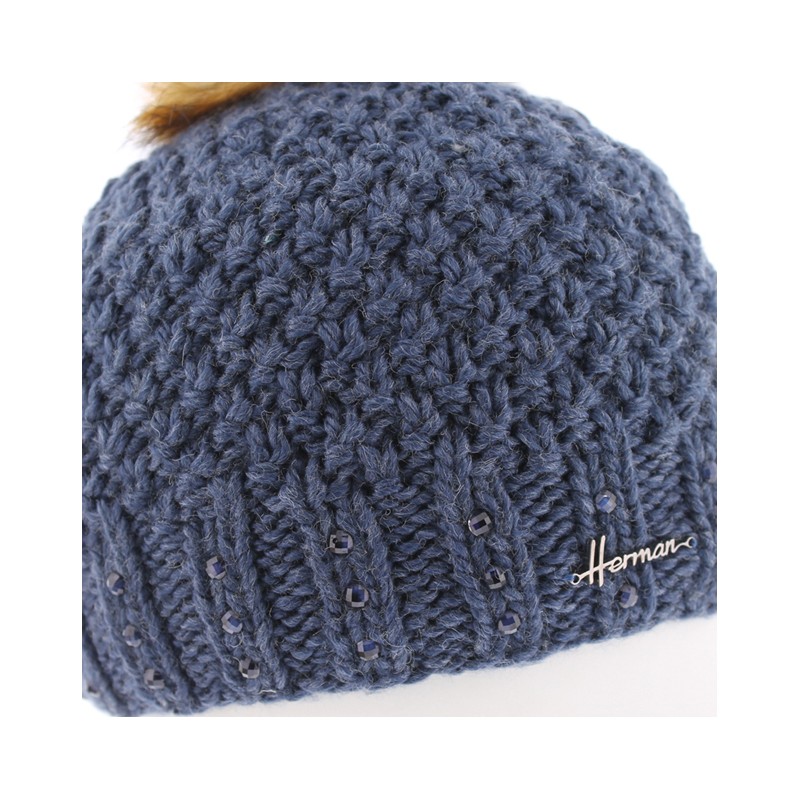 Knitted beanie with fake fur pompom